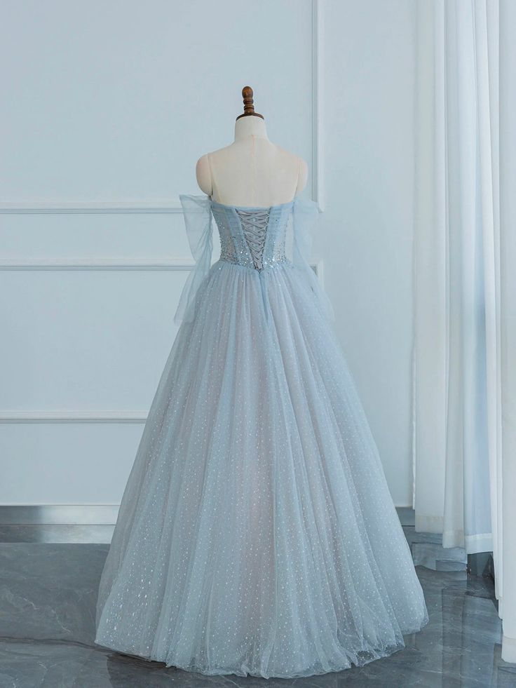 Robe de bal longue bleue scintillante à épaules dénudées et coupe trapèze J4406