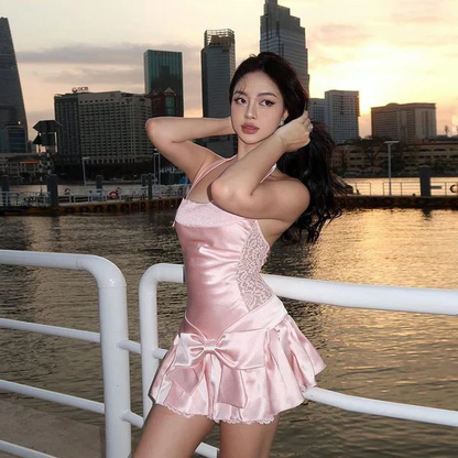 Robe de cocktail courte rose à col licou et coupe trapèze J7664