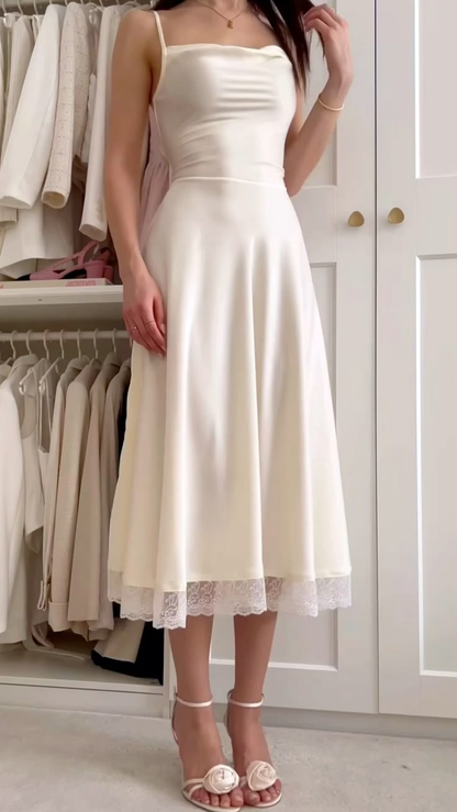 Robe de soirée en satin ivoire à bretelles spaghetti et coupe trapèze J6387