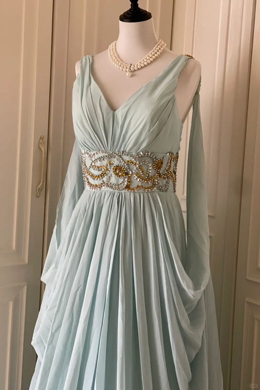 Robe de soirée trapèze en mousseline de soie bleue avec perles J8033