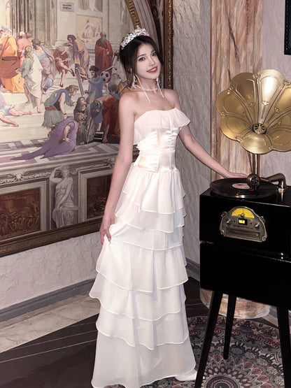 Robe de bal longue bustier en mousseline de soie ivoire à volants J5991