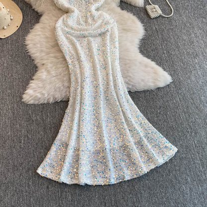 Robe mi-longue à paillettes et col licou pour femme L49