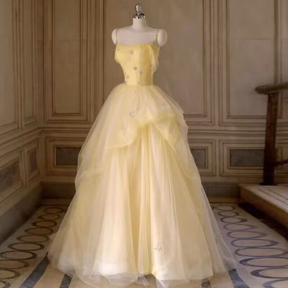 Robe de soirée longue jaune en tulle coupe trapèze J2975