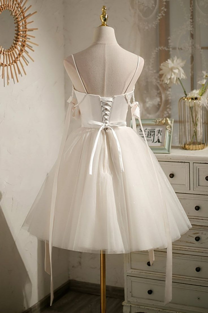 Spaghettiträger V-Ausschnitt Tüll Kurzes Homecoming-Kleid mit Schleife J7622