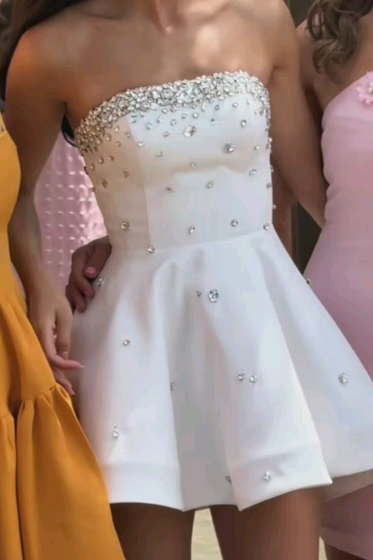 Robe d'anniversaire blanche bustier coupe trapèze avec perles J7697