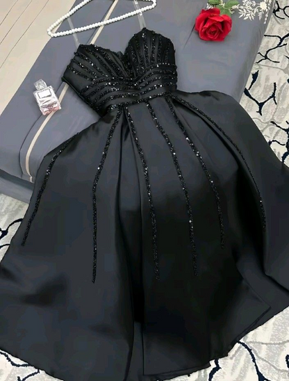 Robe de soirée longue noire trapèze à sequins J8119