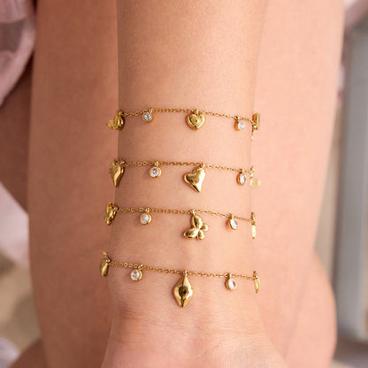 Bracelet en acier inoxydable avec zircons et motif cœur et papillon G40