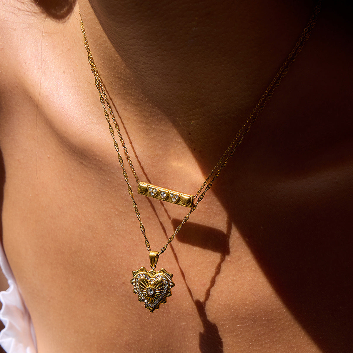 Collier en acier inoxydable doré en forme de cœur G9