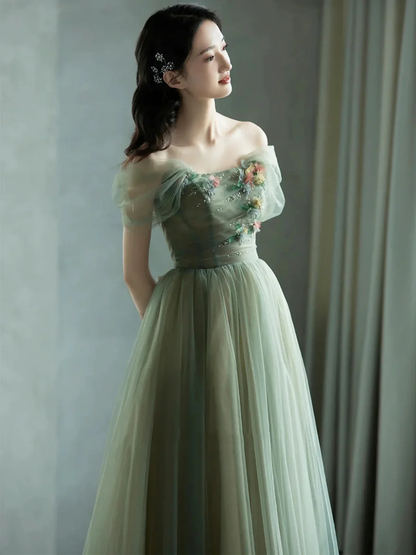 Robe de soirée trapèze en tulle vert à épaules dénudées et fleurs 3D J4475