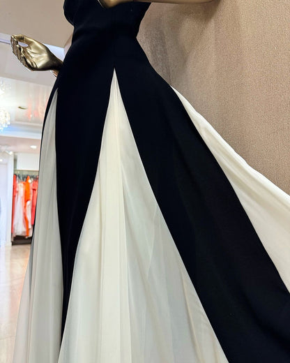 Robe de bal longue noire à bretelles spaghetti et coupe trapèze J4857