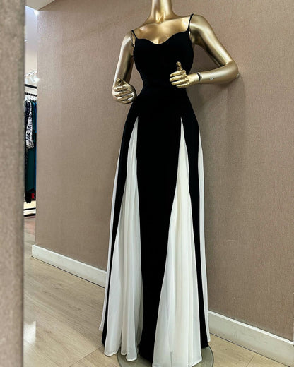 Robe de bal longue noire à bretelles spaghetti et coupe trapèze J4857
