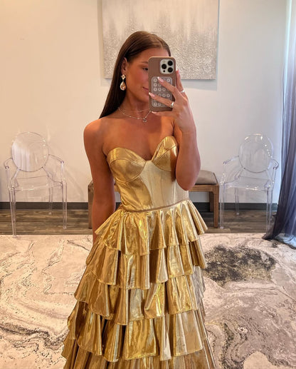 Robe de soirée longue bustier à volants et coupe trapèze dorée J5542 