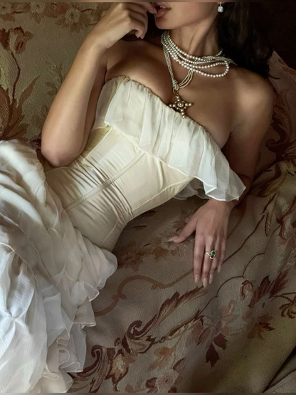 Robe de bal longue bustier en mousseline de soie ivoire à volants J5991